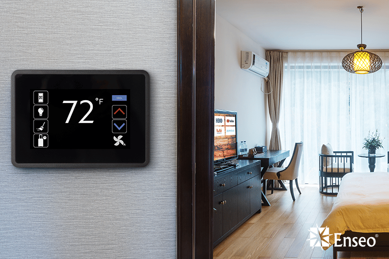 Image of hotel room with Enseo Room Controls Thermostat, TV, Lights, Shades