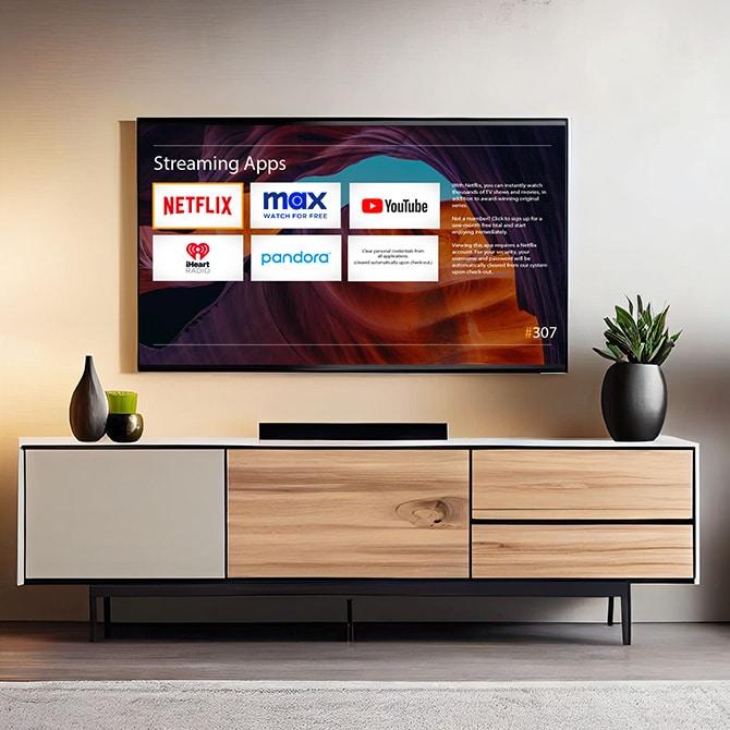 Enseo TV screen with OTT streaming apps in a hotel room