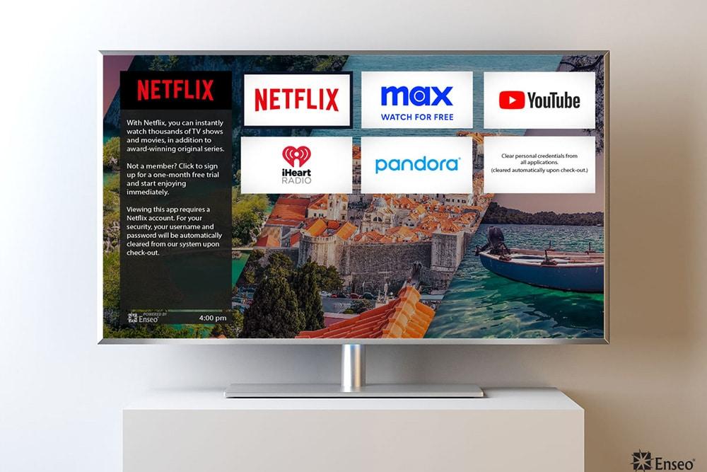 The Enseo apps TV screen, displaying Netflix, Max, YouTube, iHeart Radio, and Pandora.